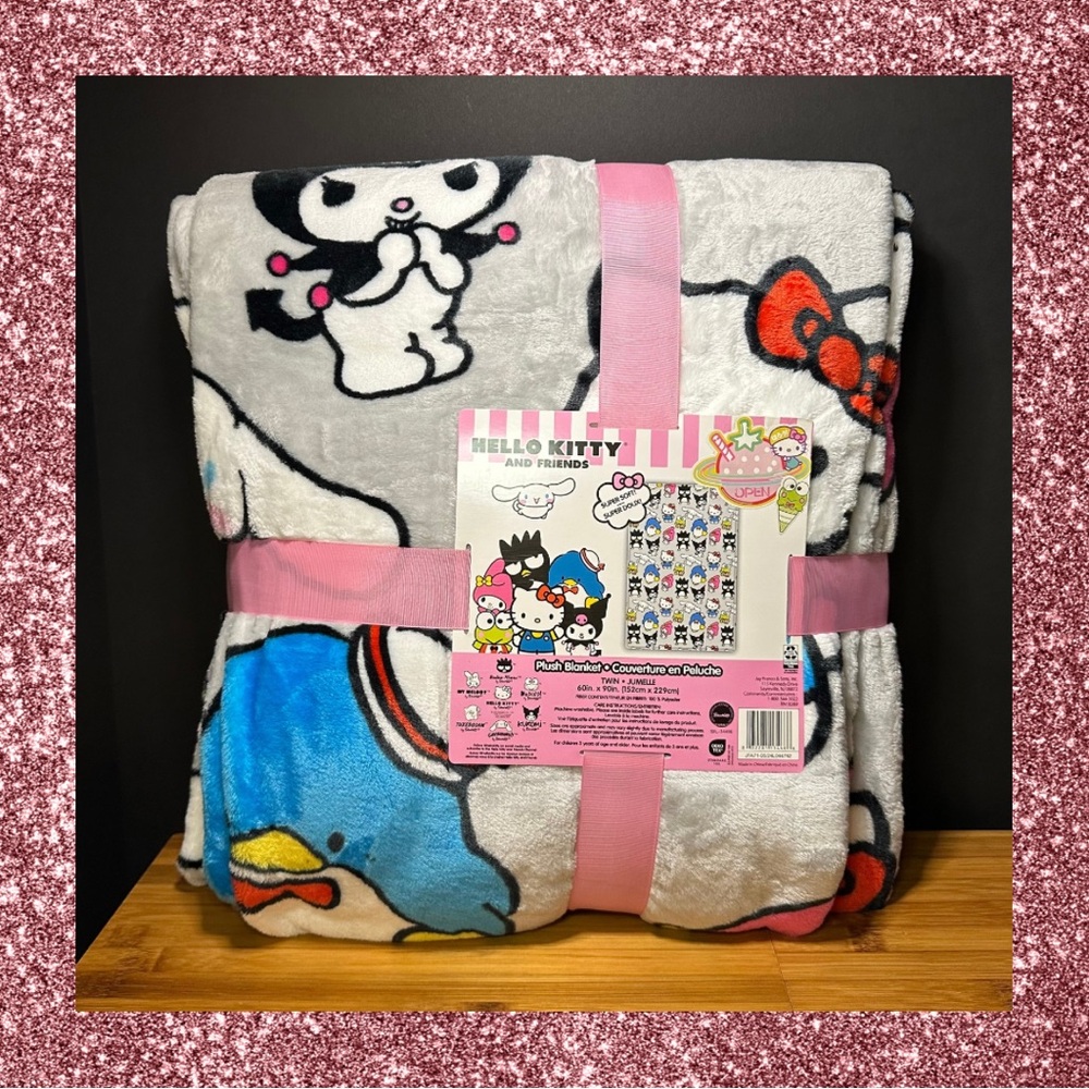 Sanrio Character Plush Blanket with Pink, Blue and Grey.